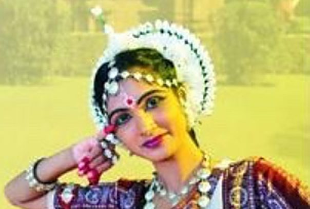 Portrait of Purnima in Odissi adornment with a delicate hand gesture